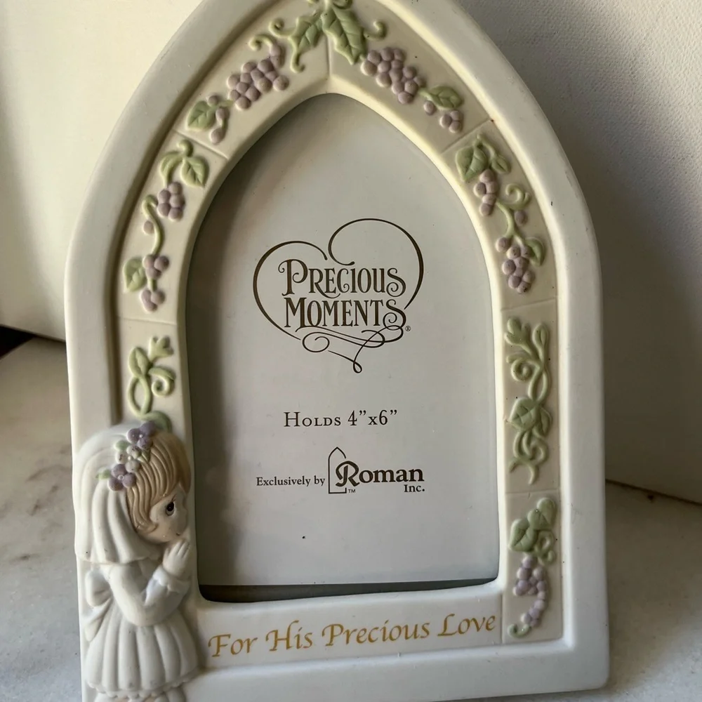 Ceramic precious moments pictures frame holds 4x6”